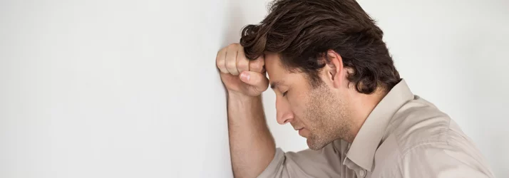Chiropractic Pooler GA Man In Pain Man holding head in pain.